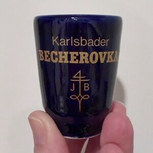 Vintage cobalt blue Karlsbader Becherovka ceramic shot glass with handle